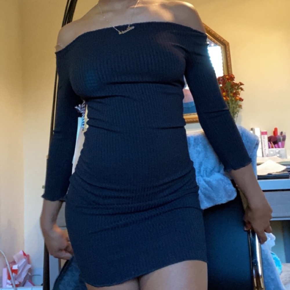 black ripped off shoulder dress